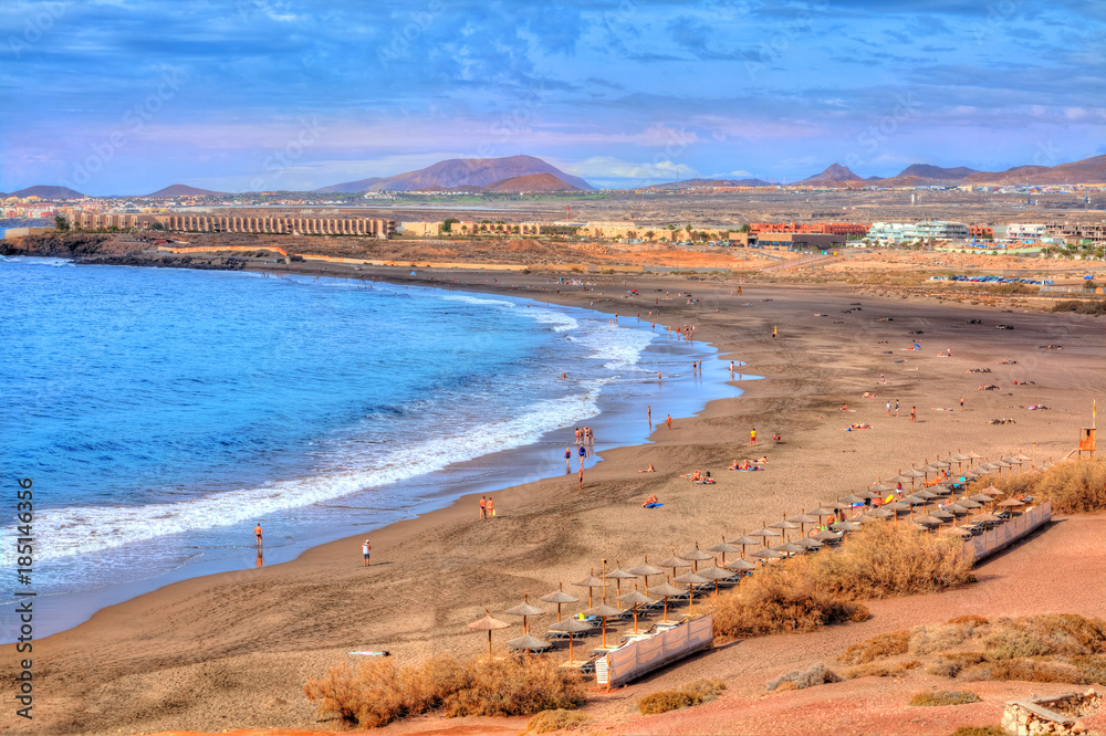 Beautiful view of Tejita beach in summer holiday vith people enjoying the vacation on Canary island, Spain Beautiful view of Tejita beach in summer holiday vith people enjoying the vacation on Canary island, Spain