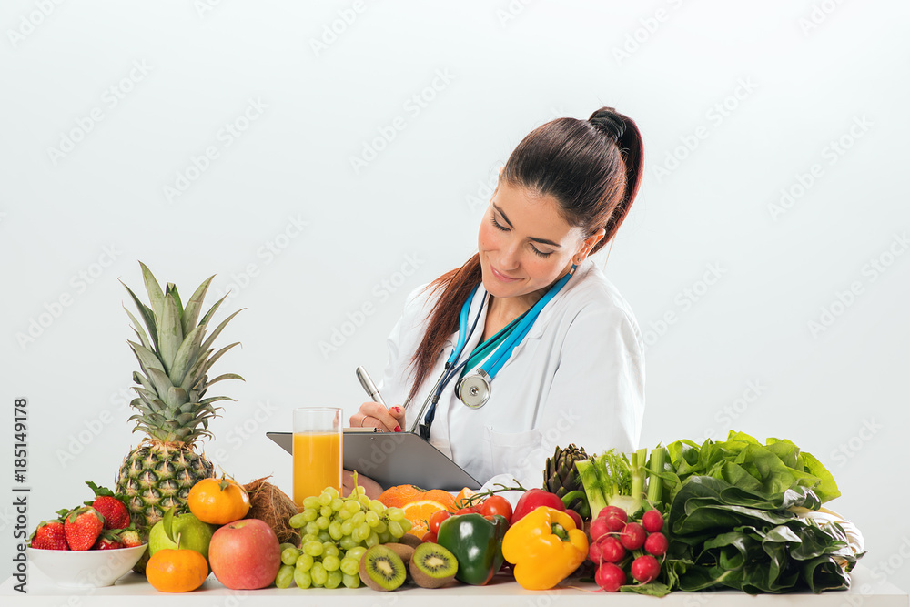 Female dietitian in uniform with stethoscope Female dietitian in uniform with stethoscope