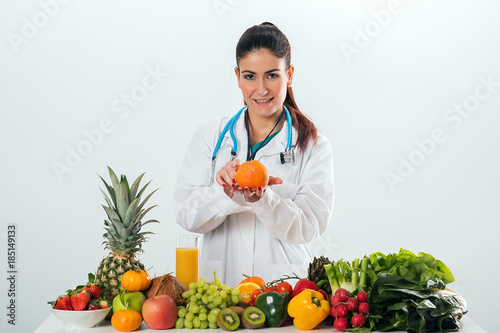 Female dietitian in uniform with stethoscope
