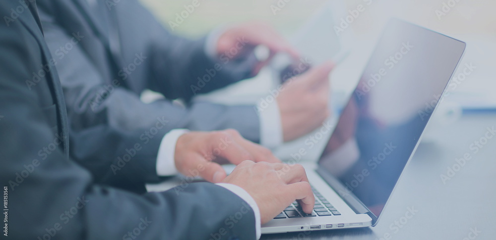 business people working with digital tablet and laptop business people working with digital tablet and laptop