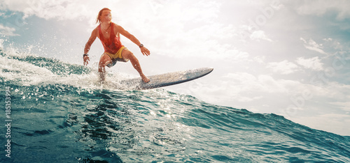 Surfer rides the ocean wave © Dudarev Mikhail