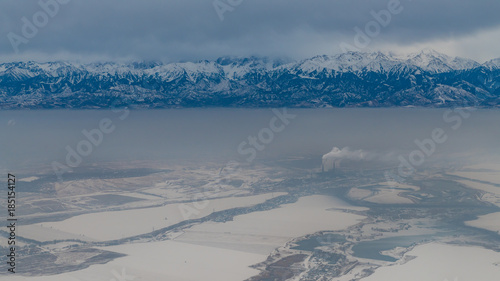 Aerial view of Pik Talgar mountain near Almaty in Kazakhstan during winter