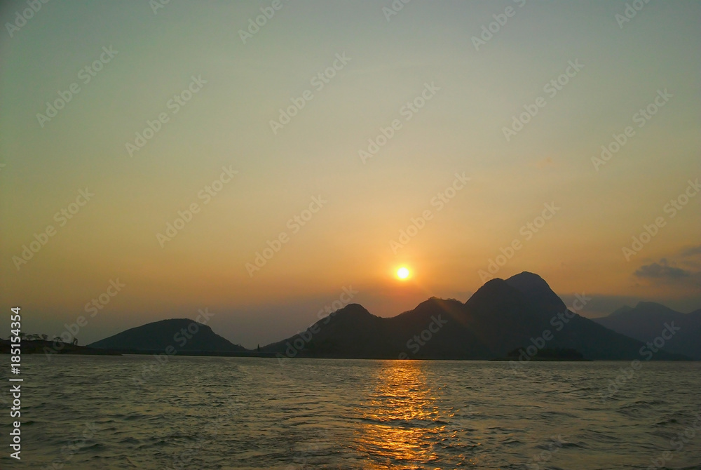 Evening sunset at mountain in India Malampuzha 