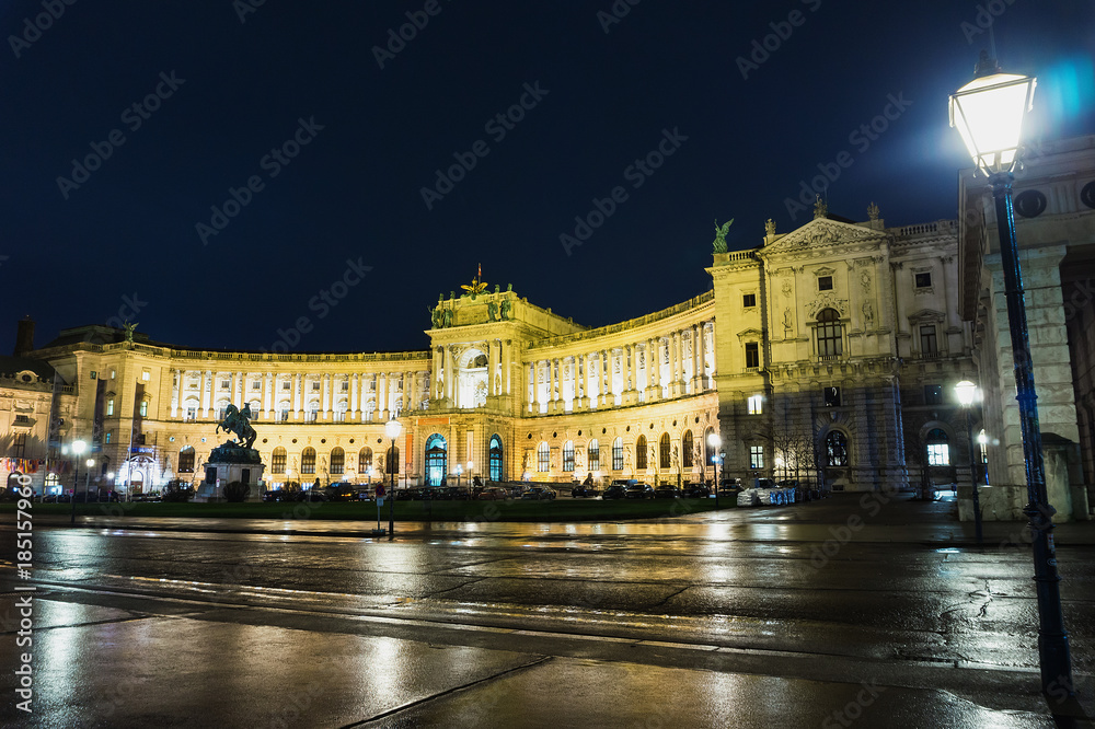 imperial palace Hofburg in Heldenplatz square in the centre of Vienna in the rainy night, Famous place of Austria.