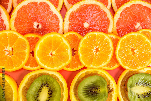 background of oranges of mandarins and grapefruits 