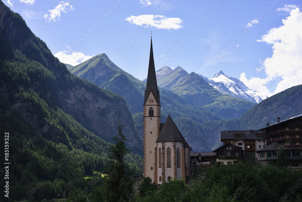 Gothic pilgrimage church dedicated to Saint Vincent of Saragossa in city Heiligenblut am Grossglockner, municipality in the district of Spittal an der Drau in Carinthia, Austria in Alps mountains.