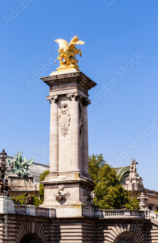 Fragment of the Alexander III Bridge across the Seine in Paris, France. View from the water