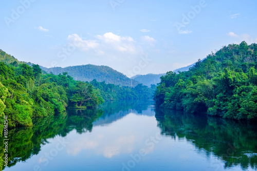 Scenery in the morning of the Srinakarin dam with the shadow reflection of water, Kanchanaburi, Thailand