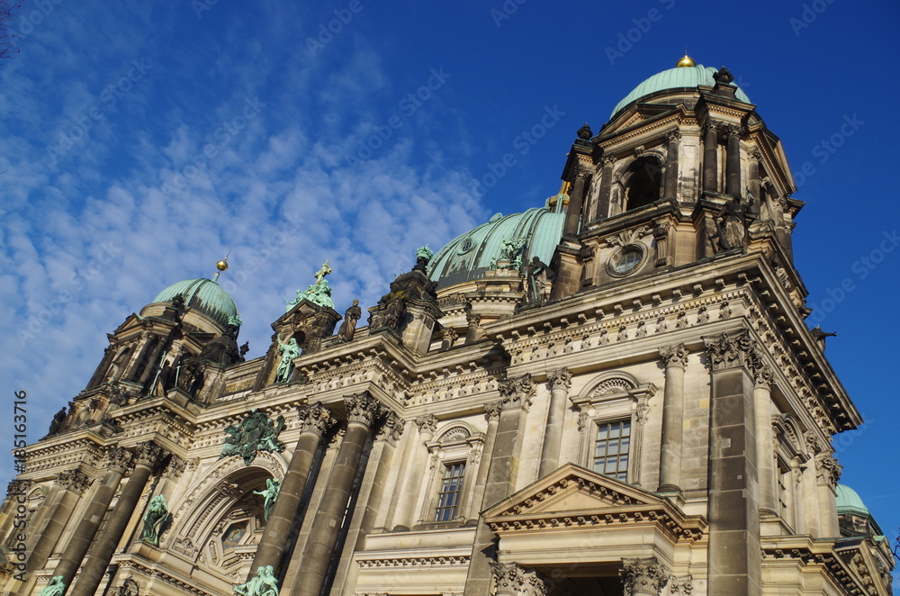 Berliner Dom - cathedral in Berlin. Rich decorations and decorative sculptures of the facade of one of the most famous churches in Germany, the historic cathedral standing on the Museum Island.