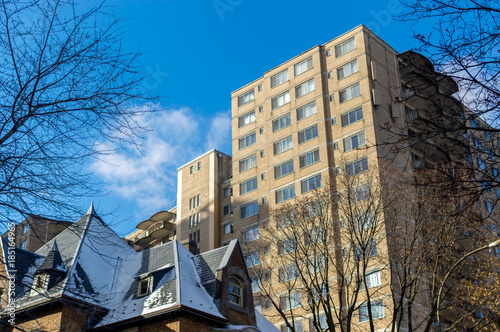 Expensive old and new houses with huge windows in Montreal downtown, Canada.