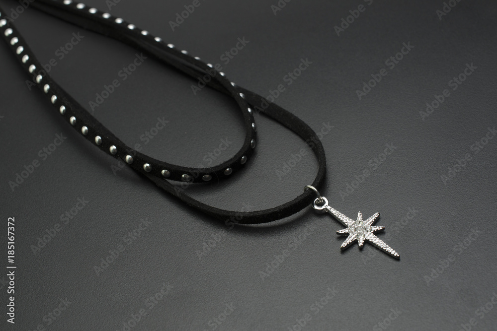 Black choker with rivets isolated Black choker with rivets isolated