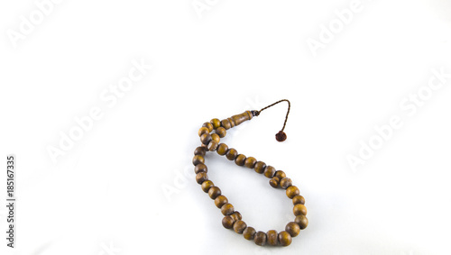 A Brown Rosary on White Background ısolated