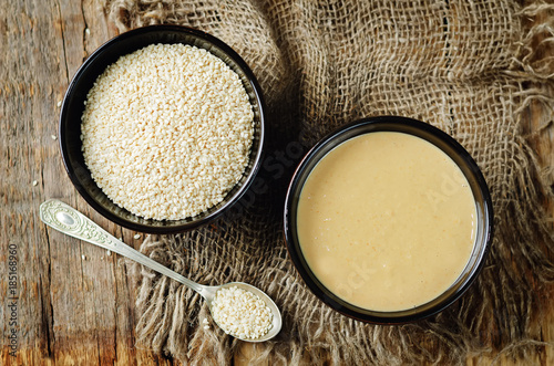 Tahini, sesame paste with sesame seeds photo