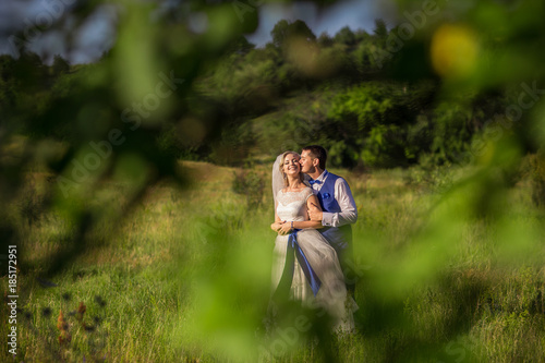 Wedding couple in forest. Bride and groom in love. Marriage concept © Wedding photography
