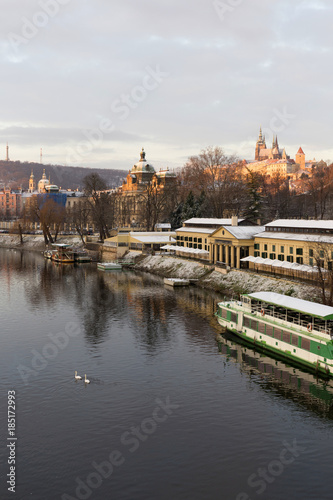 Early Morning Christmas snowy Prague Lesser Town with gothic Castle above River Vltava, Czech republic © Kajano