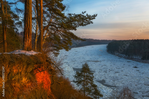 Cold winter landscape view of a frozen river