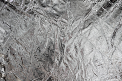 Shiny metal silver foil texture for background