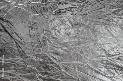 Shiny metal silver foil texture for background