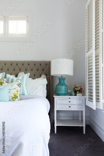 Side table details in a luxury country styled bedroom