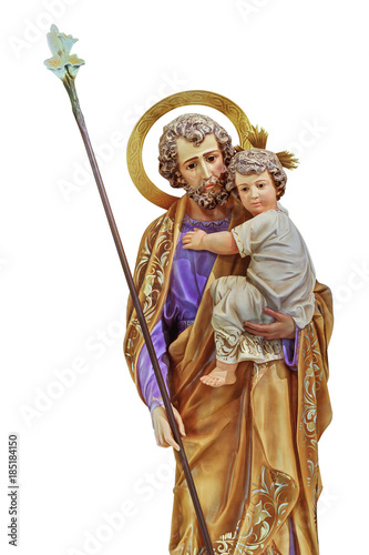 St Joseph holding the Christ child statue isolated