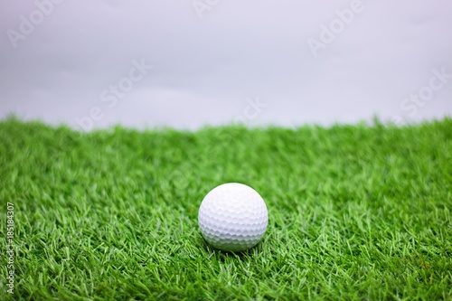 Golf ball on green grass