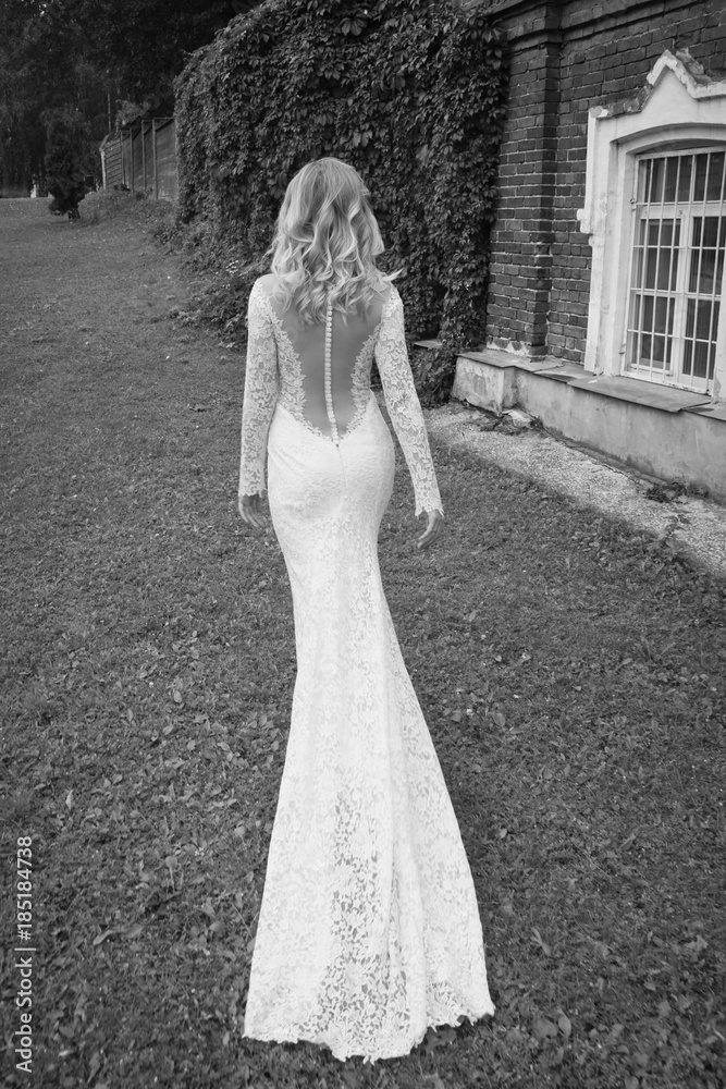 Beautiful bride in a white long dress Beautiful bride in a white long dress