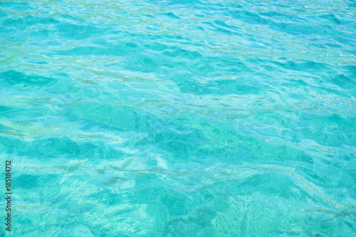 Texture of turquoise calm sea surface