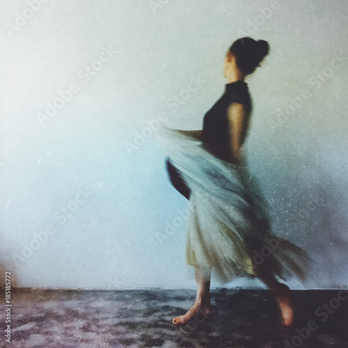 Creative cell phone photography -  heavily edited, full body shot of woman dancing photo