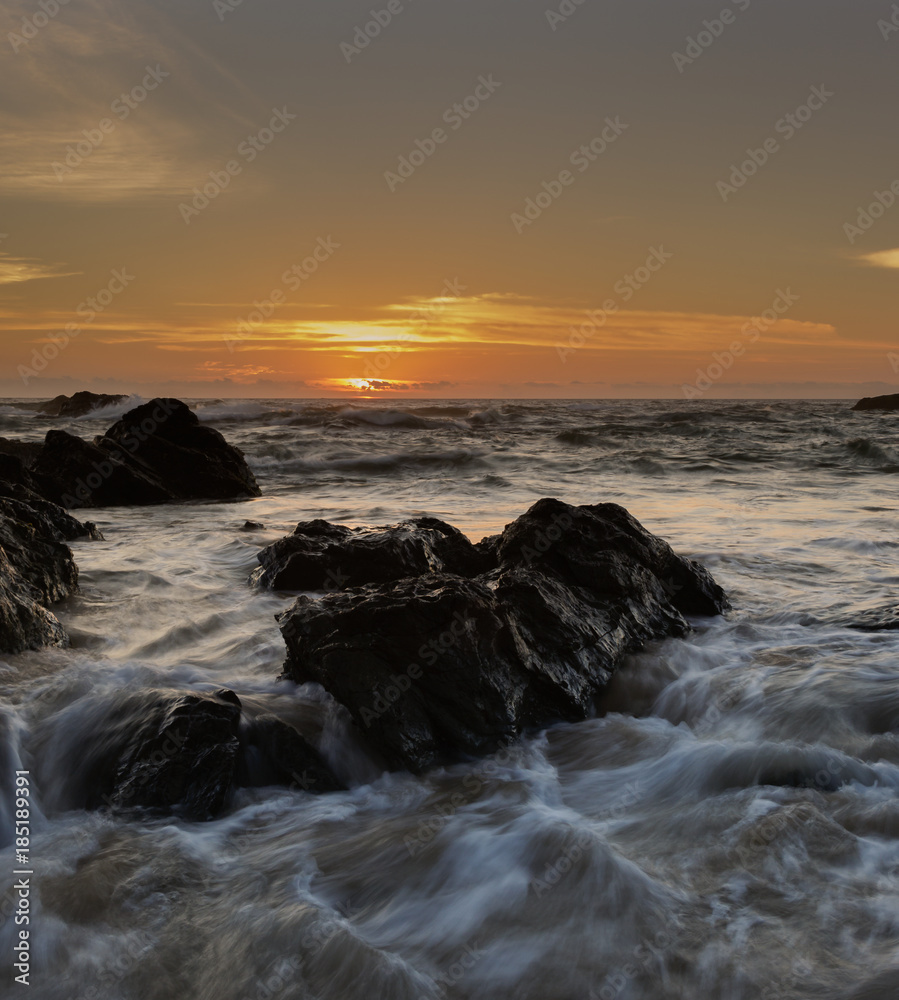 Yellow sunrise with moving water Yellow sunrise with moving water