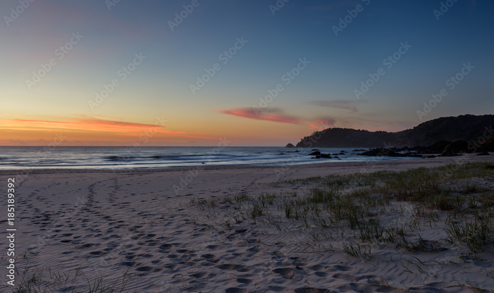Dawn over the beach and headland
