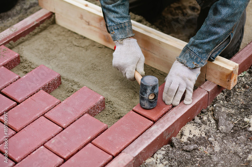 Man puts paving