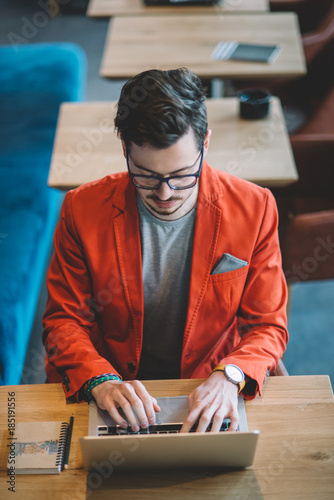 Businessman Typing on a Laptop