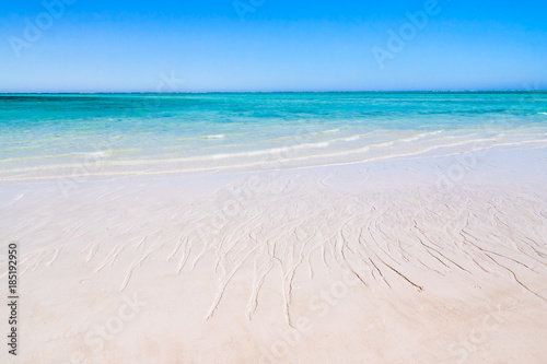 Clear waters and white sand beach