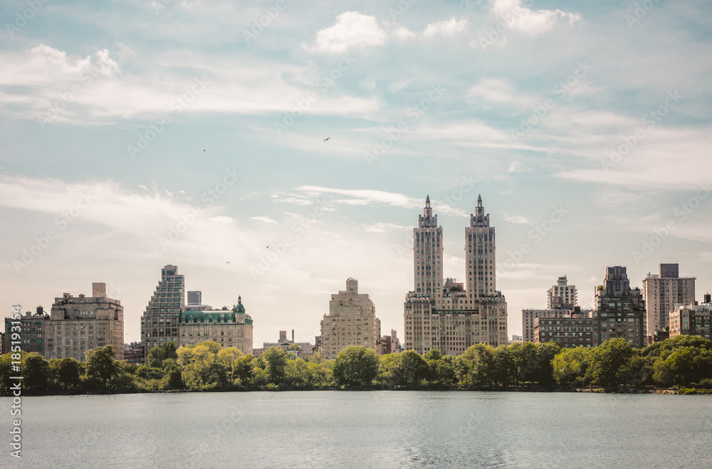Manhattan's Upper West Side Skyline as Seen Across Central Park Pond in New York City Manhattan's Upper West Side Skyline as Seen Across Central Park Pond in New York City