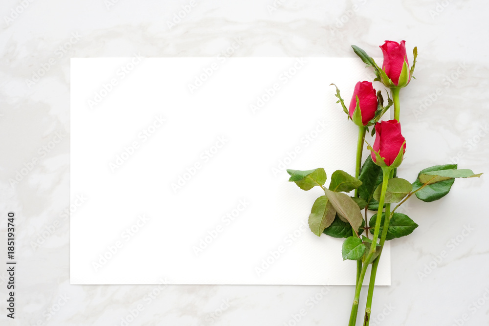 Valentine's day background, template, Red roses bouquet and blank white  paper on white marble background with copy space for text, top view, flat  lay Stock Photo | Adobe Stock