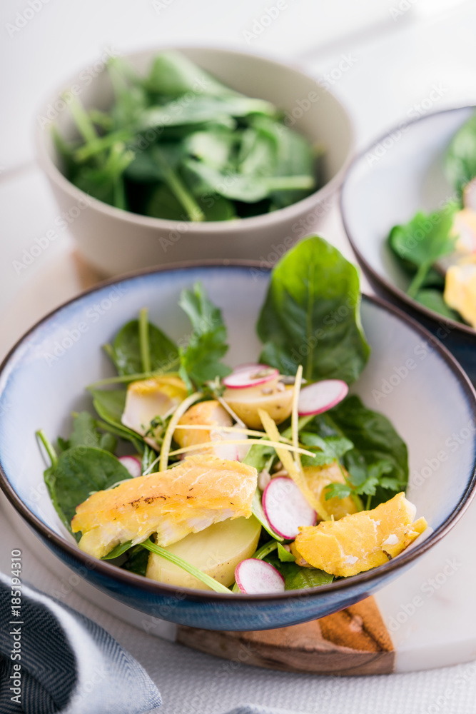 Smoked haddock,spinach and potato salad bowls. Smoked haddock,spinach and potato salad bowls.