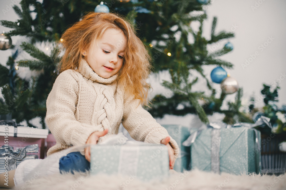 beautiful blonde girl opening gifts beautiful blonde girl opening gifts