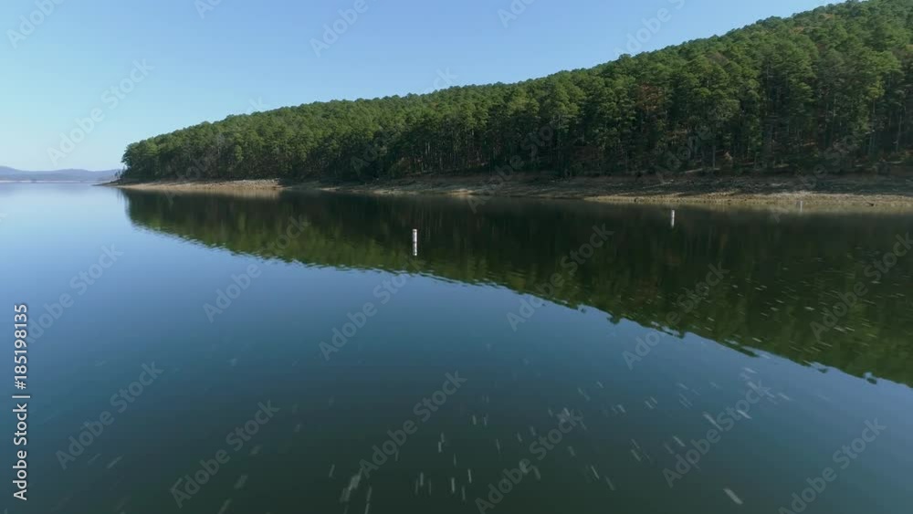 Low level flight over mountain lake in Arkansas Low level flight over mountain lake in Arkansas