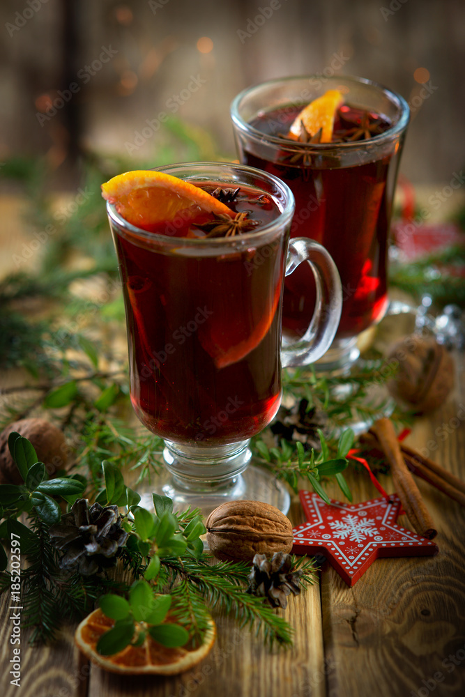 mulled wine on wooden background mulled wine on wooden background