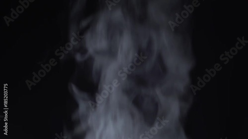 Steam rises on a black background