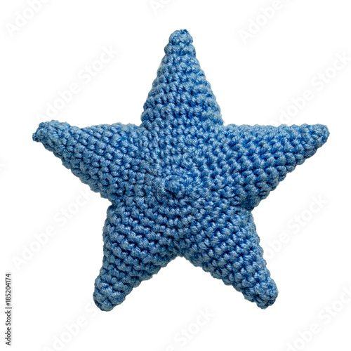 Blue crocheted star isolated on white background.