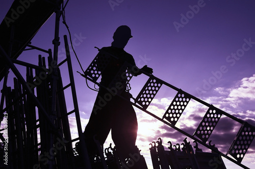 Japanese steeplejack in the morning glow
