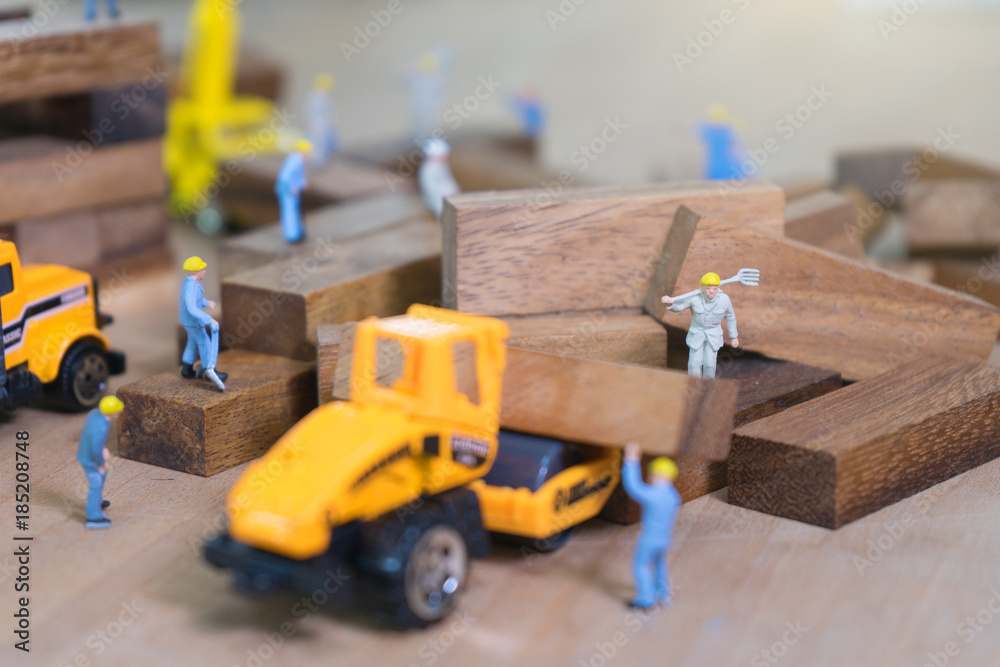 Obraz premium Industrial and construction concepts with miniature workers