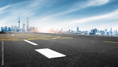 Photography empty asphalt road with cityscape of shanghai in blue sky