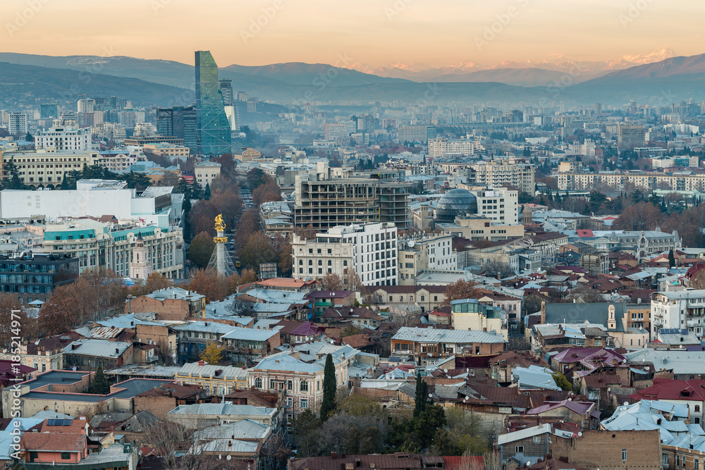 TBILISI, GEORGIA - DEC. 12, 2017 : The city of Tbilisi in the evening taken from the hill