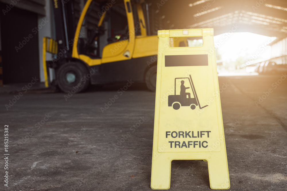 Naklejka premium Sign showing warning of caution forklifts at industrial for safety.