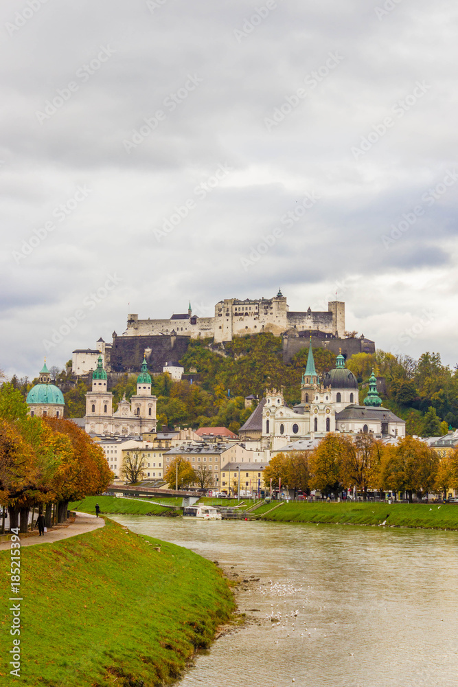 View of historic city of Salzburg over Salzach river,  with Festung Hohensalzburg, Austria