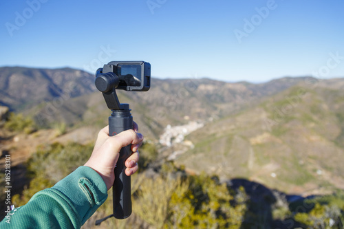 A steadycam with action camera