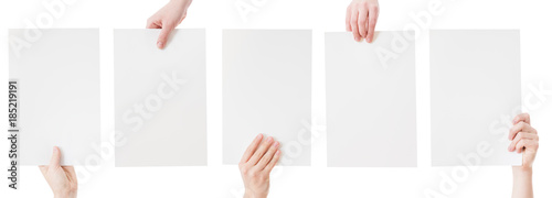 hands holding blank paper isolated photo