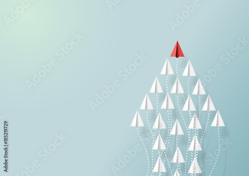 Paper airplanes in form of arrow shape flying on blue sky.Paper art style of business teamwork creative concept idea.Vector illustration